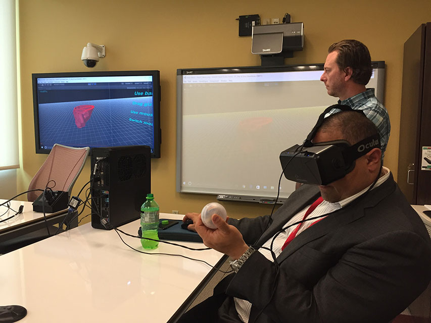 Learner using VR headset in conference room