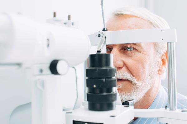 Senior male getting an eye exam.jpg
