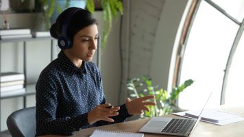 Female seated at computer