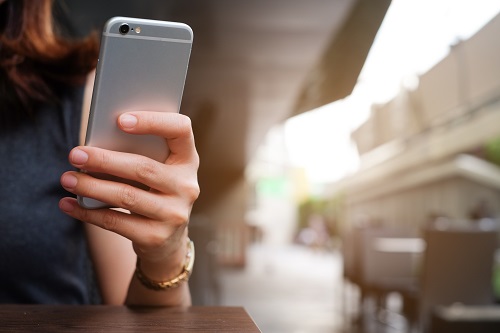 Woman using smart phone