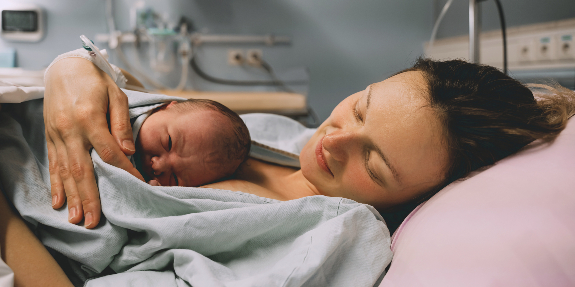 Mother Holding Newwborn Baby