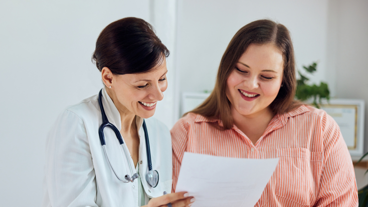 Nurse With Adult Female Patient