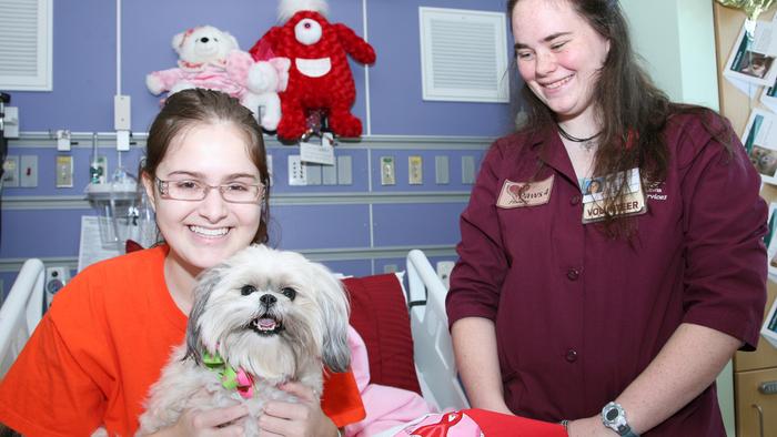 Patient With PAWS For Healing Dog