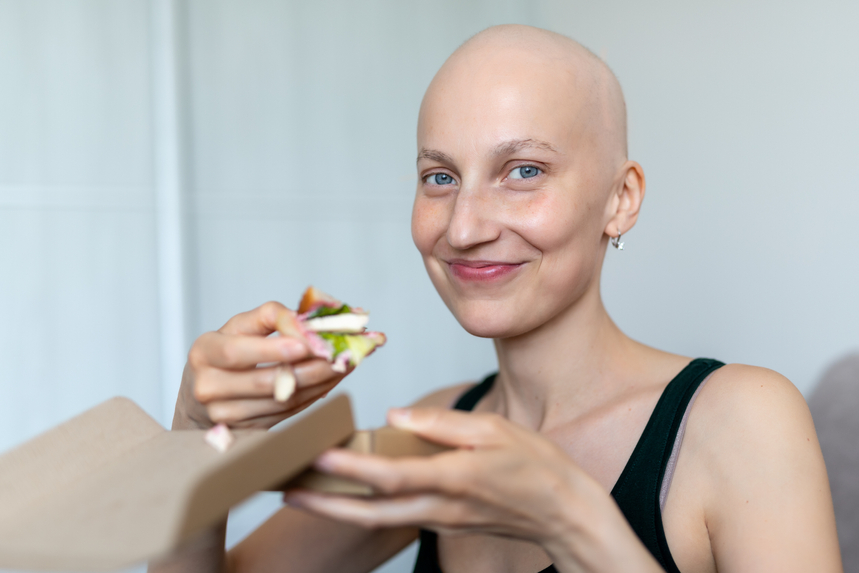 Woman with cancer eating healthy