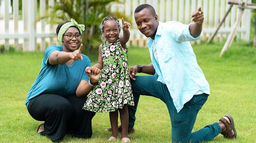 African American Family In Backyard