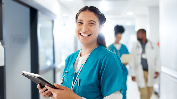 Female physician holding a tablet
