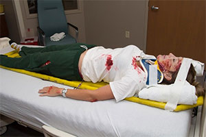 Simulated patient with faux trauma injuries