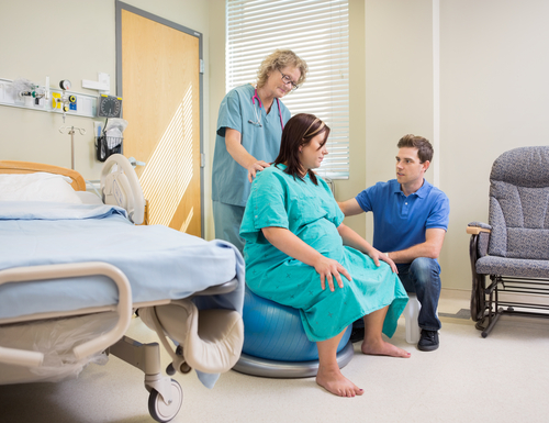 Pregnant women on birthing ball