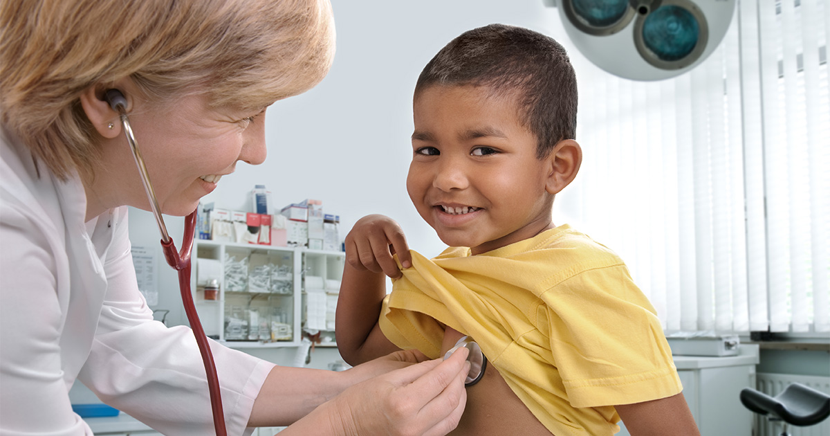 Child being examined by a doctor