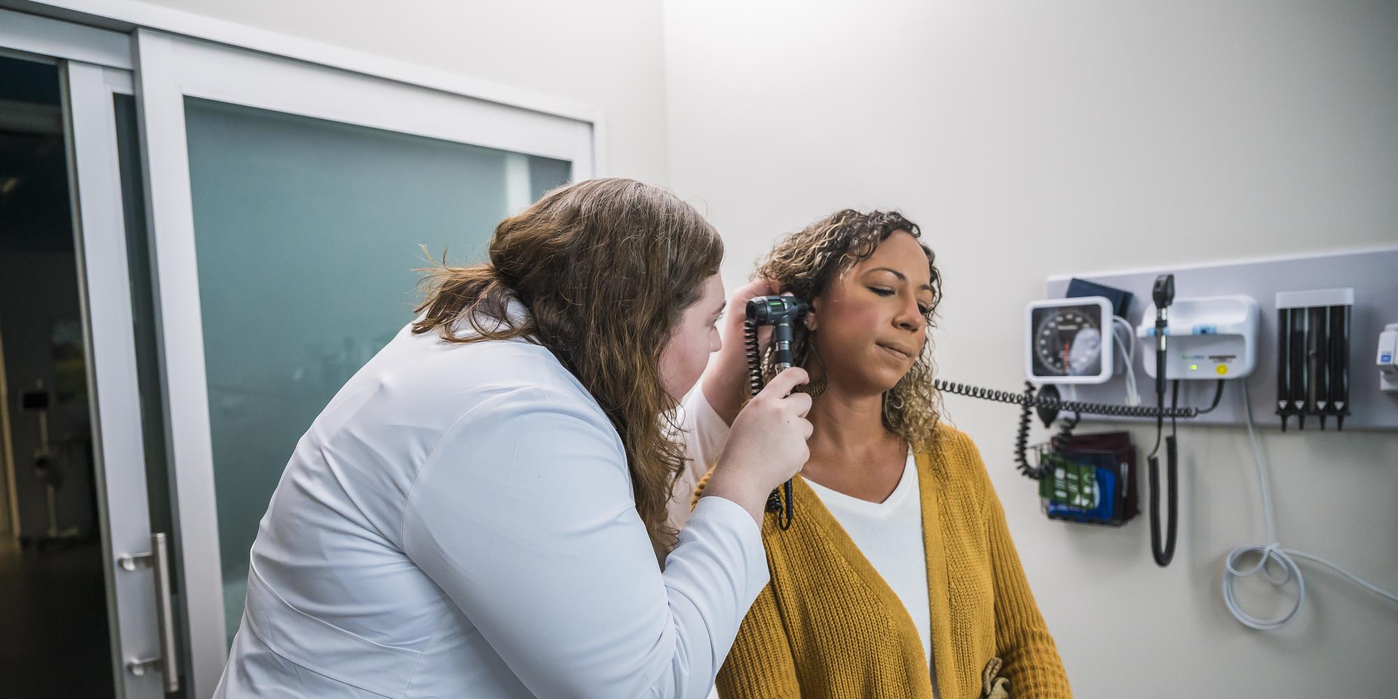 Urgent care female patient being examined