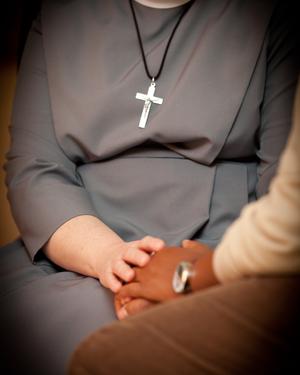 Sister giving support | OSF Heart of Mary Medical Center 
