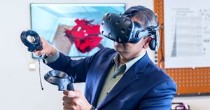 Physician using virtual reality headset.