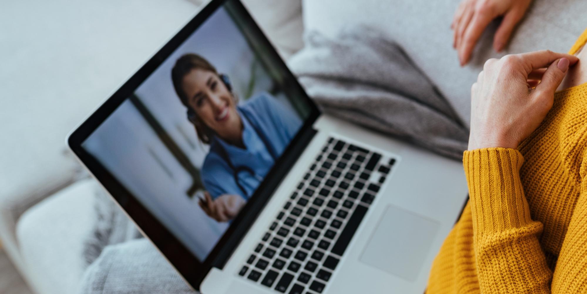 Woman talking to doctor on laptop.jpg