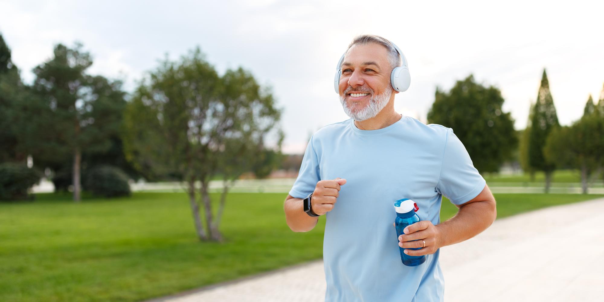 Man jogging with water