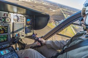 OSF EMS Life Flight pilot looking out of cockpit