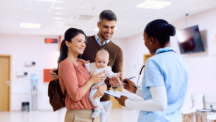 happy family communicating with pediatric nurse