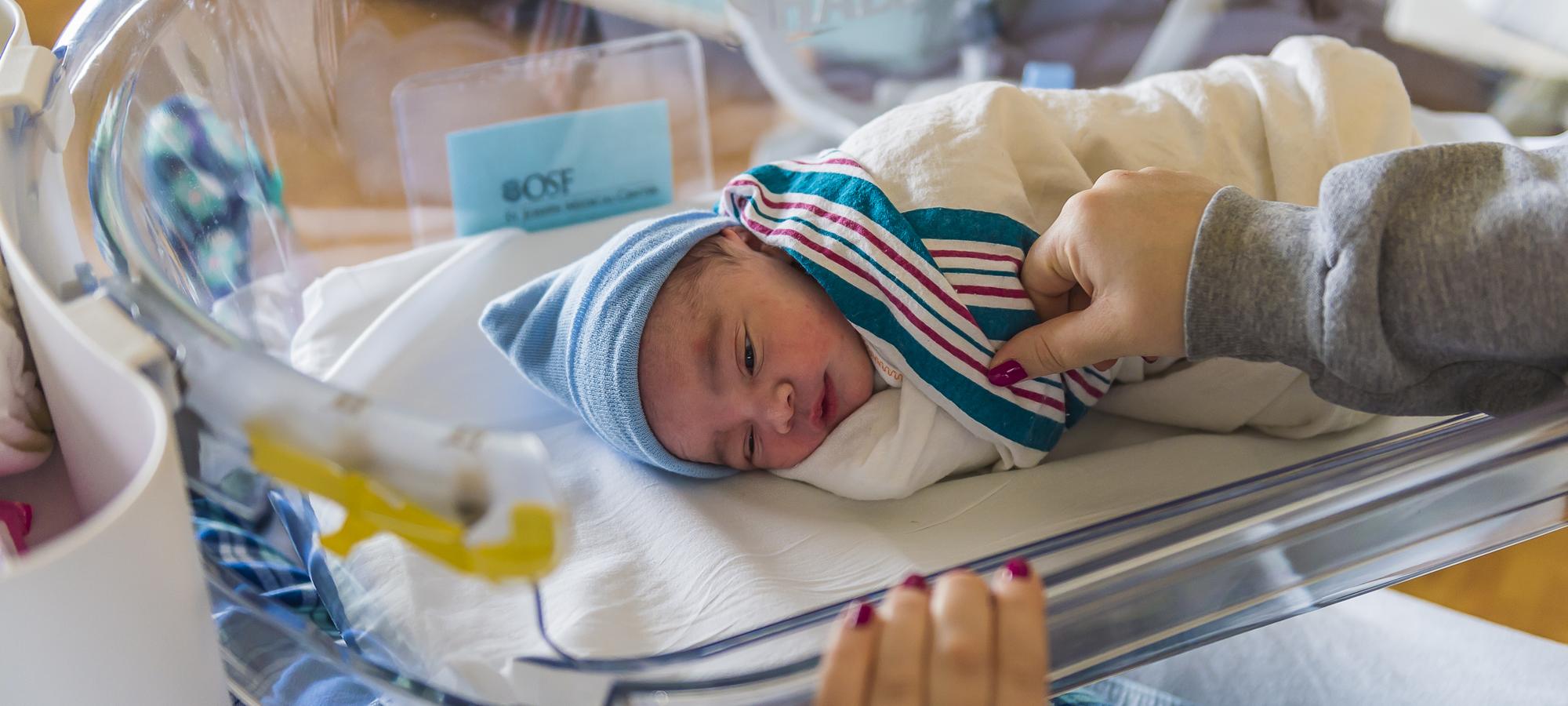 Baby in bassinet