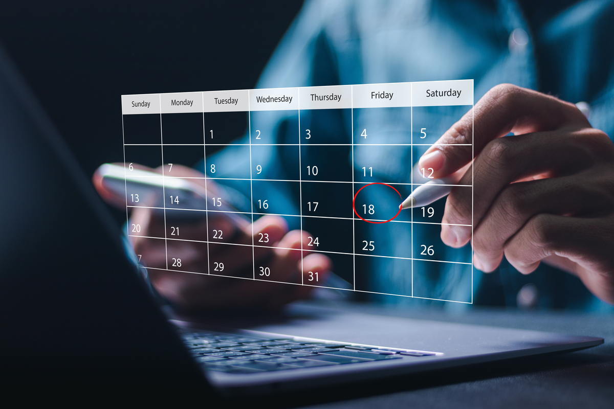 Digital Calendar Projection Hovers Above a Laptop Computer