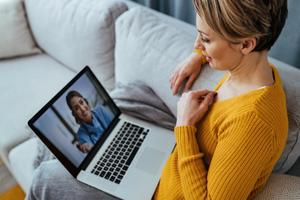 Woman talking to doctor on laptop.jpg