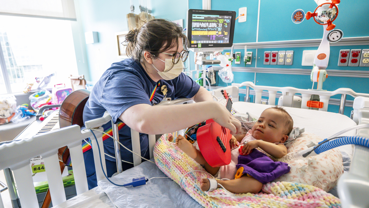 Provider with guitar soothing baby