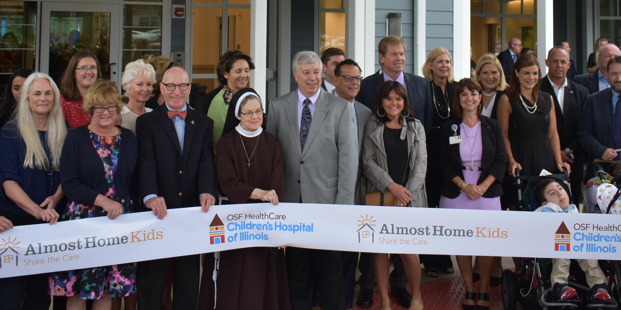 Foundation Almost Home Kids Ribbon Cutting
