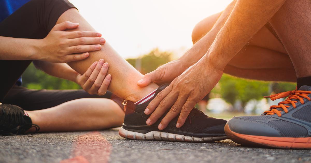 ankle-sprained-young-woman-suffering-injury.jpg