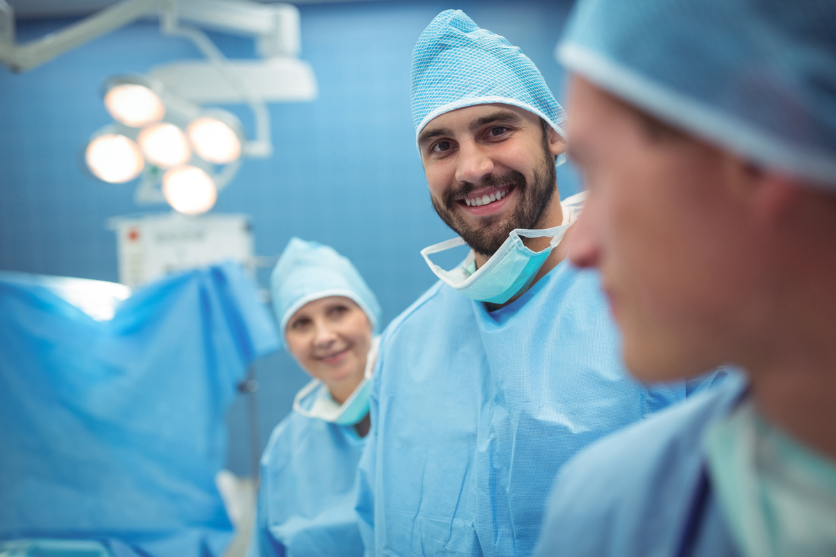 Male Surgeon Smiles in the OR