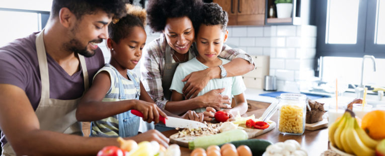 Stock of family cooking healthy meal