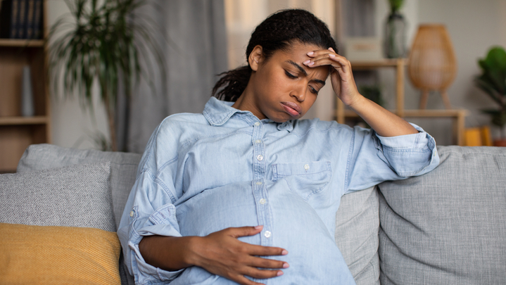 pregnancy-sickness-unhappy-pregnant-african-american.jpg