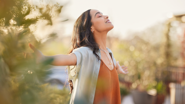 Latin Woman With Arms Outstreched