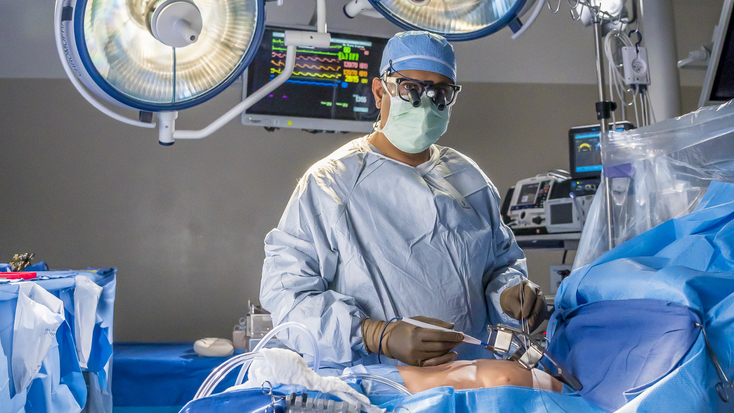 Cardiovascular surgeon preforming surgery
