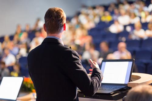 Speaker in front of audience