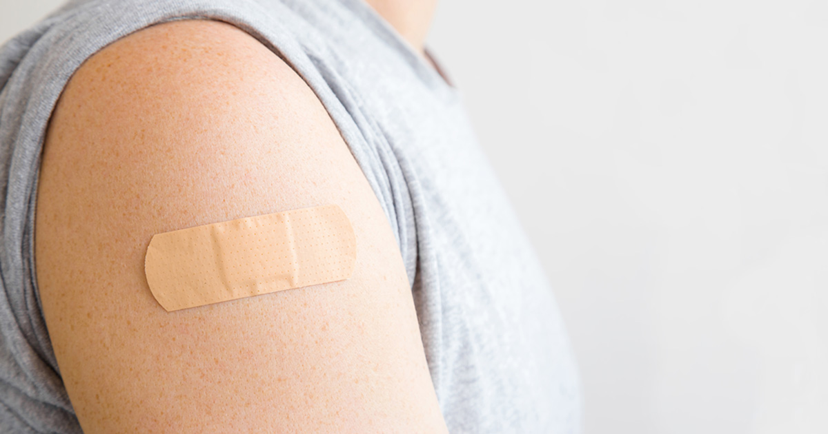 Band-aid on upper arm