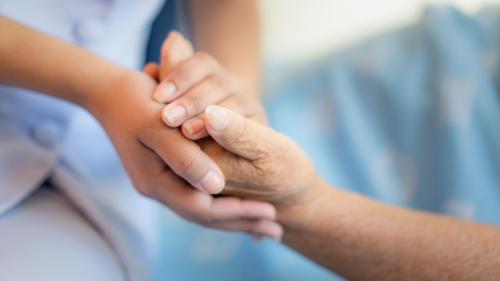 Holding A Patient's Hand