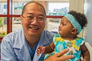 Neurosurgery doctor with a child